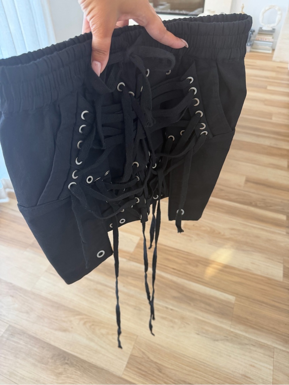 Black Lace-Up Skirt with Grommet Detail - Picture 2 of 3